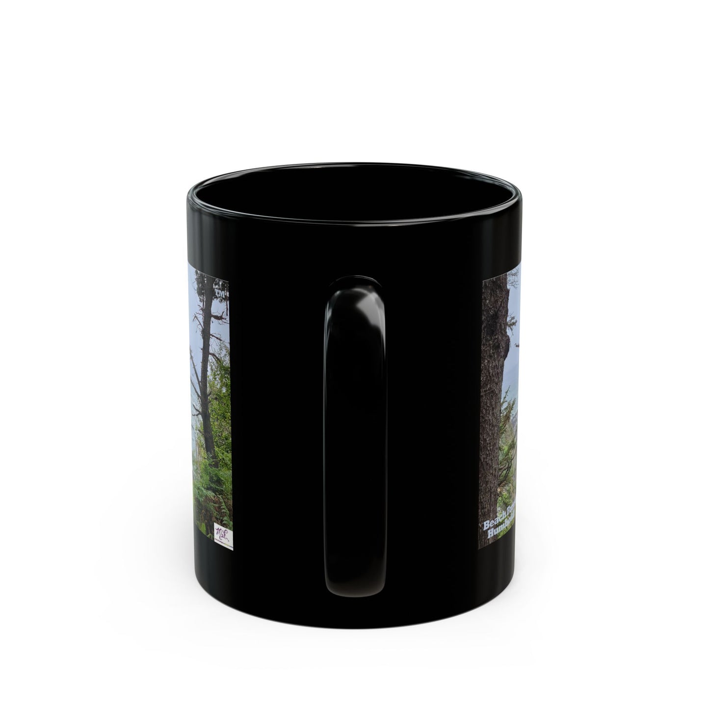 Black Mug 11oz - "Beach Forest Humboldt(tm)" - MiE Designs Shop. Sitka Spuce flank a trailhead leading down to rocky coastline below. Handle view