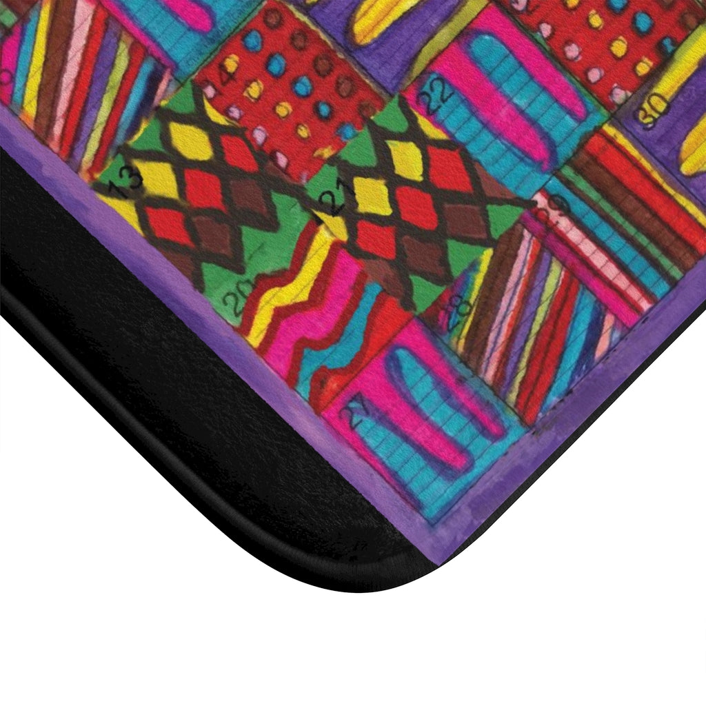 Bath Rug 24x17: "Psychedelic Calendar(tm)" - Vibrant - MiE Designs Shop. Black surrounds centered month w/varied patterns. Corner