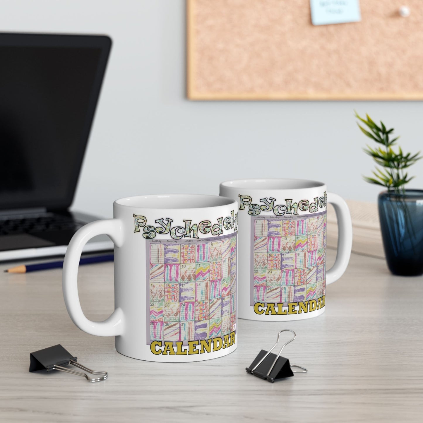 Mug 11oz: Psychedelic Calendar(tm)-Seeped- MiE Designs Shop. Pastel mazes switch day2day, Glittery top letters, block style below. Mugs on desk.