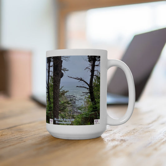 Ceramic Mug 15oz - "Beach Forest Humboldt(tm)" - MiE Designs Shop. Sitka Spuce flank a trailhead leading down to rocky coastline below. On desk