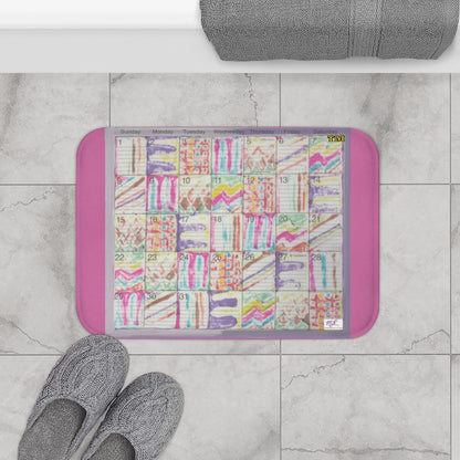 Bath Rug 24x17: "Psychedelic Calendar(tm)" - Seeped - MiE Designs Shop. Pink surrounds centered month w/varied patterns.