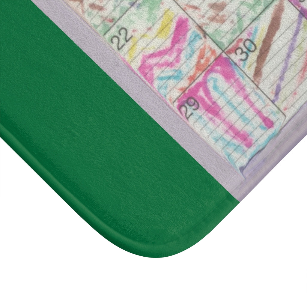 Bath Rug 34x21: "Psychedelic Calendar(tm)" - Seeped - MiE Designs Shop. Dark green around centered month of patterns. Corner.