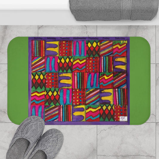 Bath Rug 34x21: "Psychedelic Calendar(tm)" - Vibrant - MiE Designs Shop. Green surrounds centered month w/varied patterns.