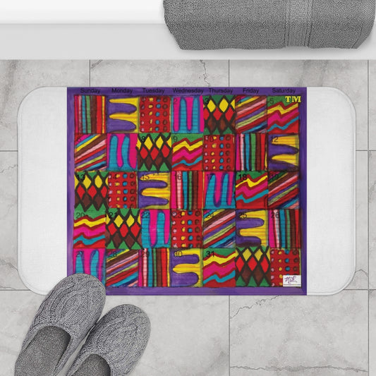 Bath Rug 34x21: "Psychedelic Calendar(tm)" - Vibrant - MiE Designs Shop. White surrounds centered month w/varied patterns.